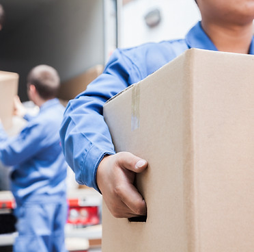 Workers Moving Boxes
