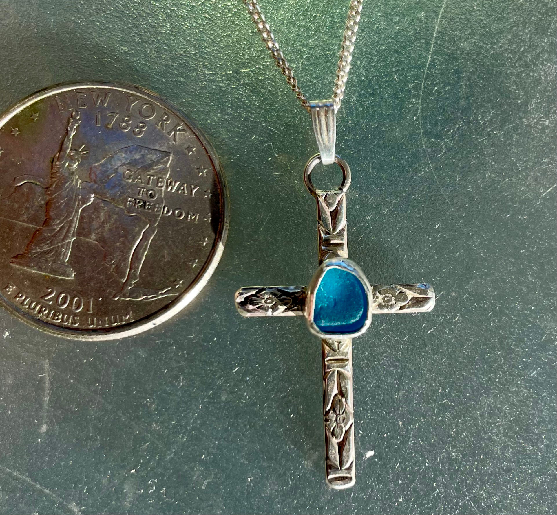 Sterling silver bezel set English sea glass cross