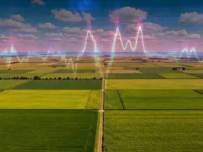 Aerial view of farmland with graph overlay