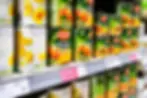 Del Monte peaches cans on shelf