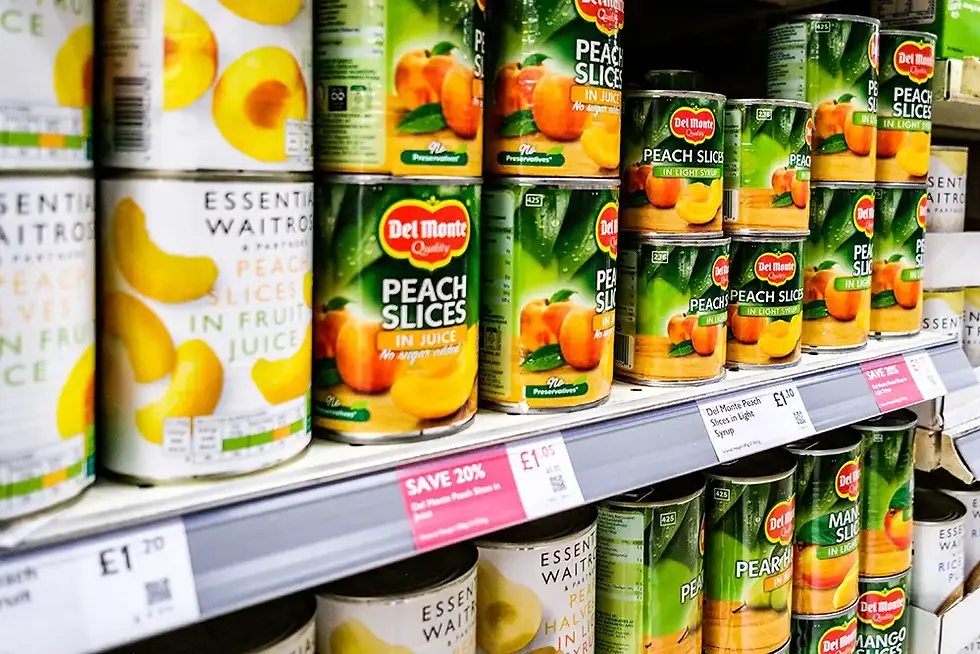Del Monte peaches cans on shelf
