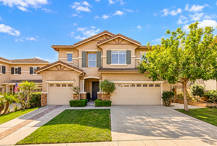 Sunlit Beige Suburban Home Facade - Copy.png