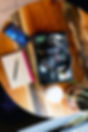 Flatlay image of Dorothy's laptop, headphones, phone, notebook, and coffee on a cafe table | Dorothy Fee | freelance copywriter | copywriting portfolio