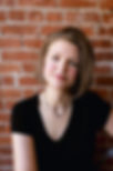 Headshot of Dorothy looking directly into the camera with a calm smile | Dorothy Fee | freelance copywriter | copywriting portfolio