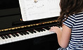 Girl Playing Beginner Piano