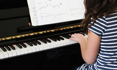 Learner playing piano