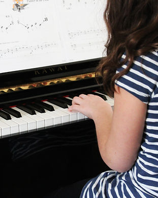 Girl Playing Beginner Piano