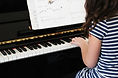 Girl Playing Beginner Piano