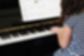 Girl Playing Beginner Piano
