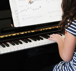 Girl Playing Beginner Piano
