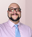 Executive Director in pink shirt and blue tie