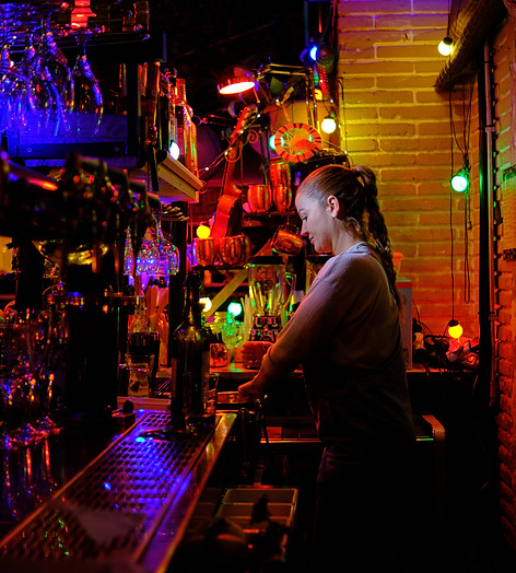 female-bartender-standing-behind-the-counter-prepa-2025-03-08-09-57-42-utc.jpg