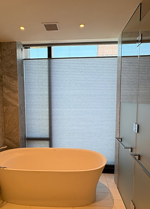 Custom window treatments installed by The Shade Doctor