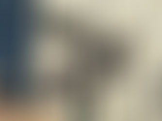 Two one-way street signs point in opposite directions against an urban backdrop, symbolizing urban chaos and decision-making dilemmas.