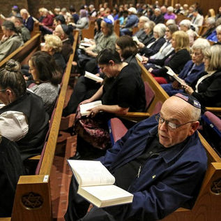 ‘We are better than that’: Sabbath service held in memory of lives lost in synagogue massacre