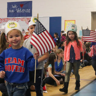 Veterans honored during Troy Hofer School celebration in Shorewood
