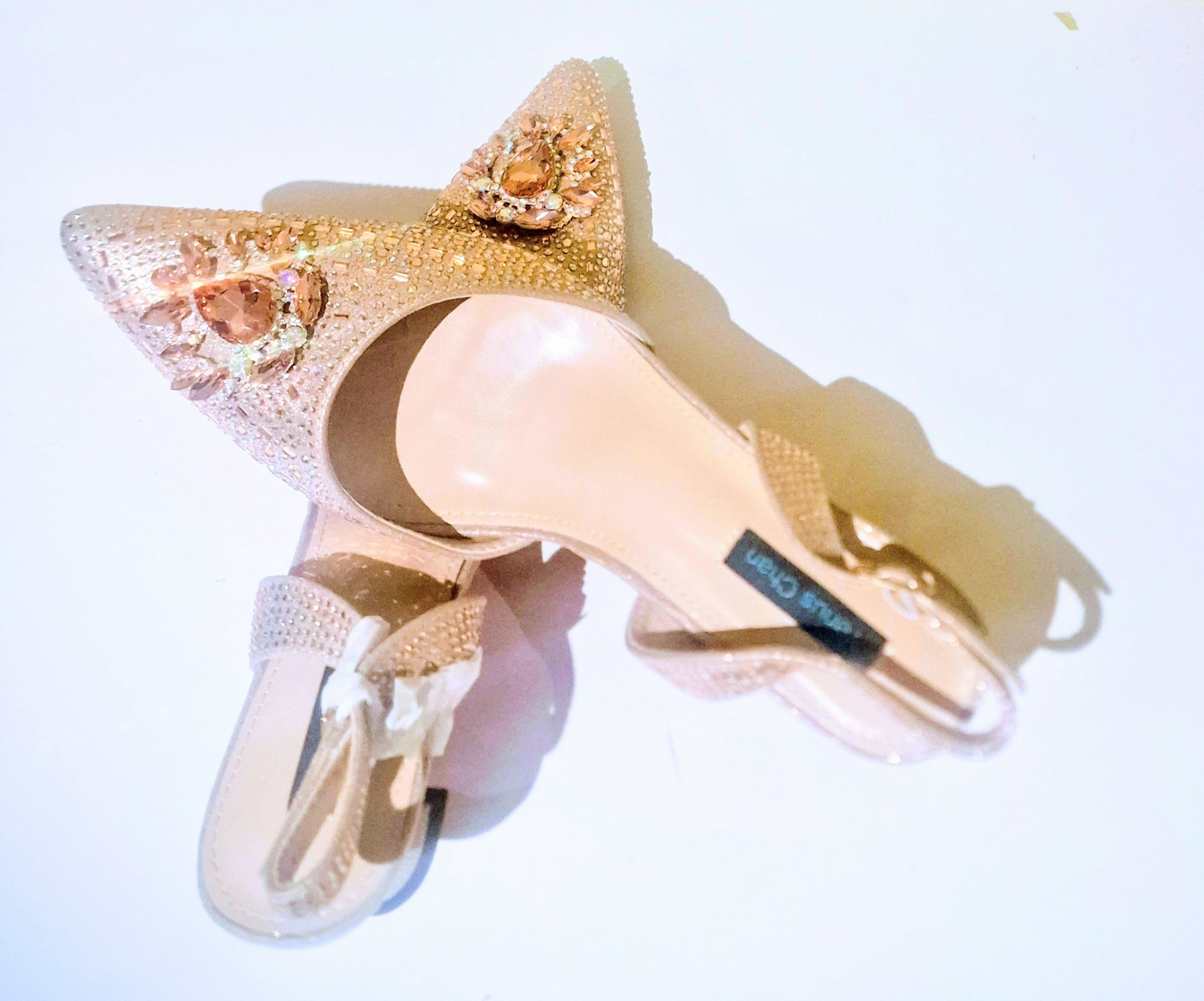 Gold platform court shoes with top motif