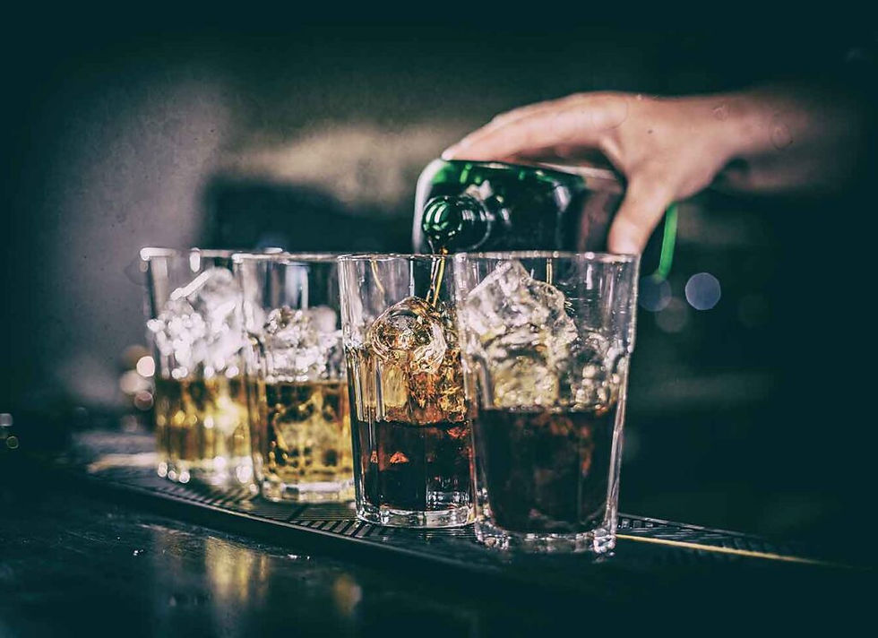 whiskey being poured into 4 glasses - image for personal injury attorney blog Injured by a Drunk Driver