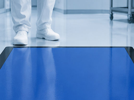 Washable decontamination mat for controlled environments