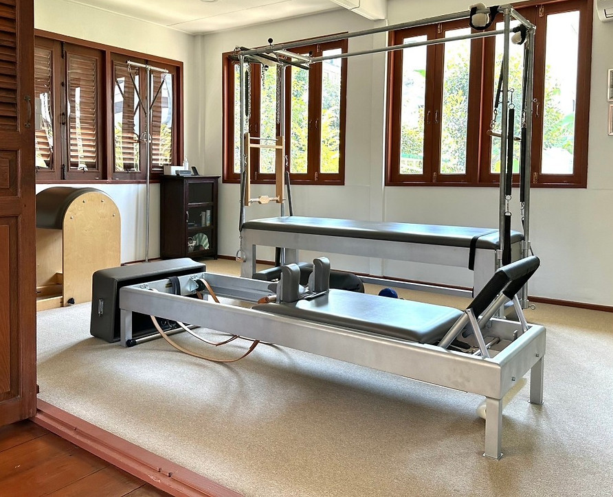 Interior view of the modern and spacious Pilates studio at Sita Pilates Thailand.