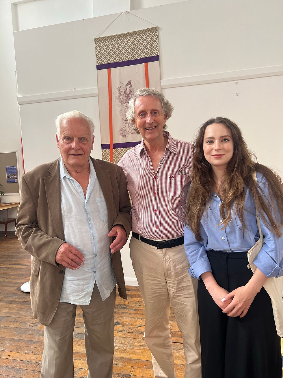 A picture of Dr. John Webster, Prof. Clive Phillips and Jaime Anderson taken at the "Letters in Animal Ethics and Welfare" book launch