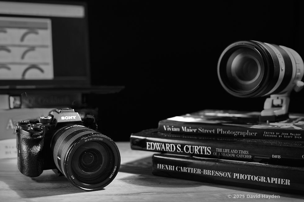 A harmonious blend of technical precision and artistic expression: cameras and photography books underscore the journey from data analytics to lighting mastery.