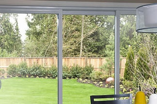 Huge garden windows overlooking a garden