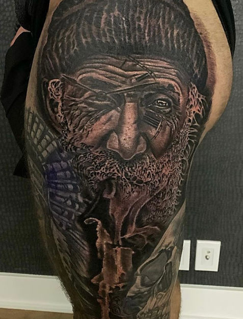 A tattoo on the upper leg