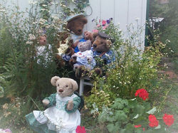 Gramma & Grampa Bear along with Hilda Bear, the maid in front, eagerly waiting to meet the new guest
