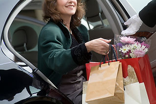 Woman running errands and holding shopping bags
