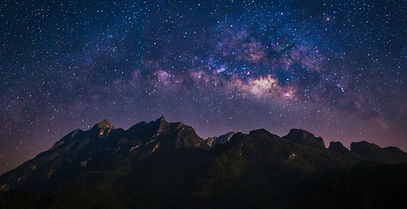 Nature landscape view of mountain range with universe space of milky way galaxy and stars
