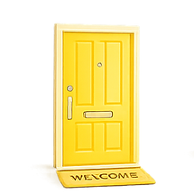 Yellow front door with a 'WELCOME' doormat