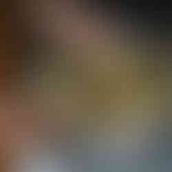 Person holding plate of tacos with ingredients on a counter. Little Marketing Help.