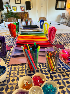 Colorful art supplies and paper for parties