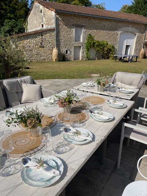 French countryside holiday rental with outdoor dining space
