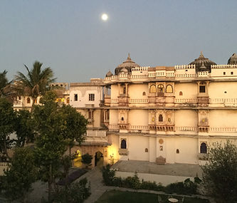 Ornate building under full moon, perfect for a yoga retreat