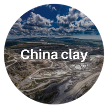 Aerial view of a China clay mining pit, beautiful landscape and cloudy sky.