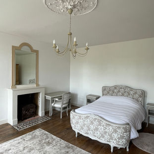 Peaceful guest bedroom overlooking the gardens
