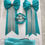 Thumbnail: Turquoise and silver bows with matching tie and buttonhole 