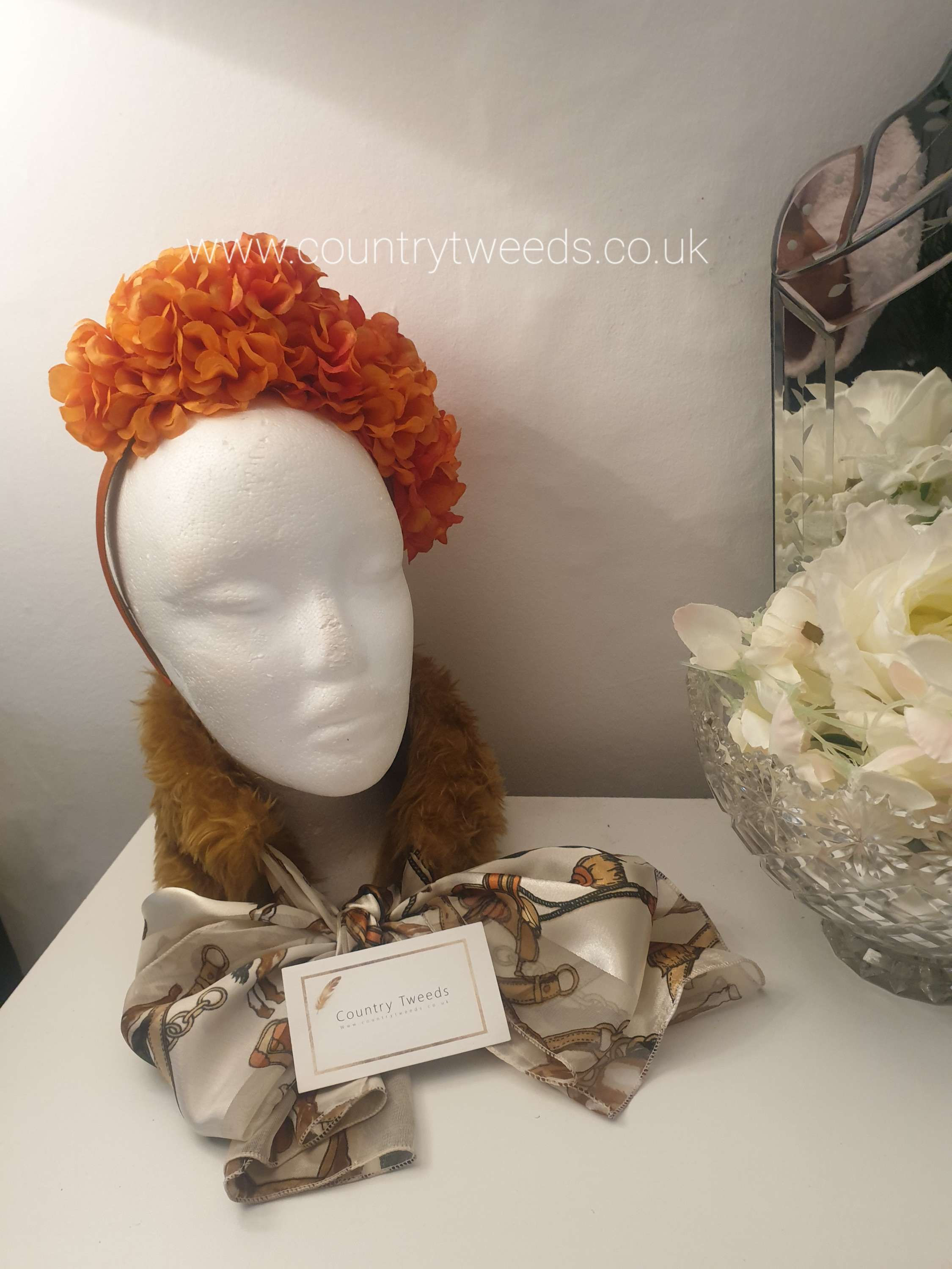 Orange flower fascinator 