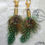 Thumbnail: Green spotted feather Boot tassles 