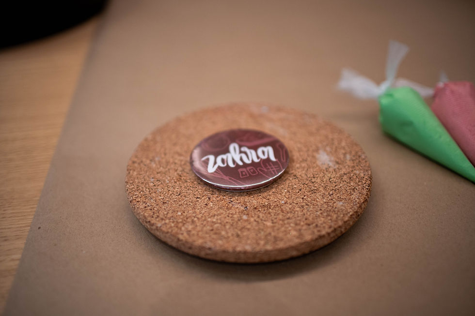 A personalized name button for a cake event in vancouver