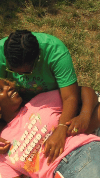 Video of couple in DTC merch at the beach and in a park