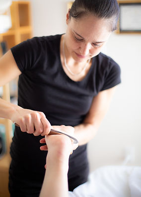 Tabitha uses Instrument Assisted Soft Tissue Mobilization (IASTM) techniques