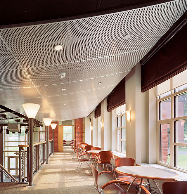 Concealed fire sprinklers in a cafeteria's ceiling