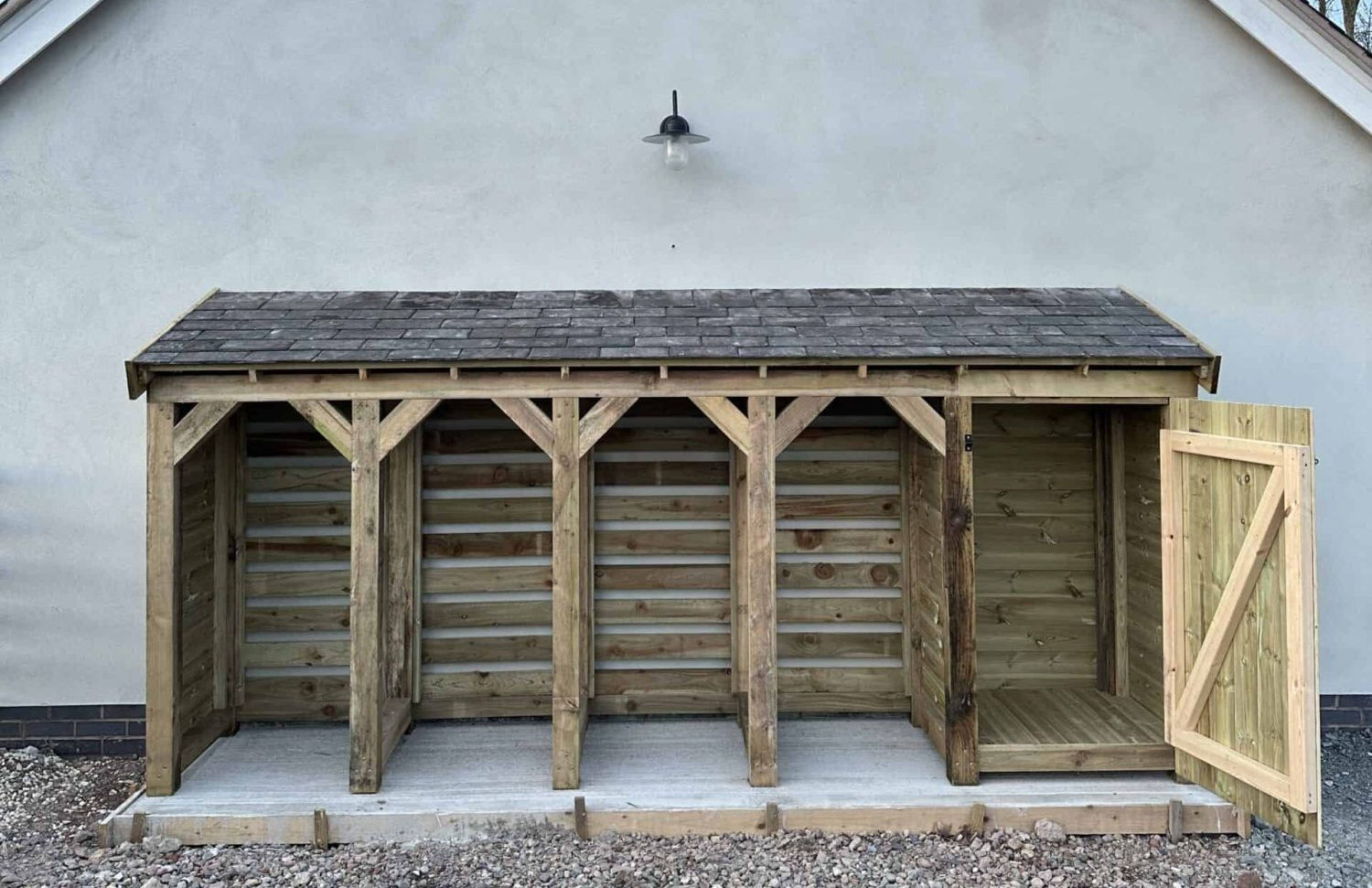 Handmade UK Wheelie Bin and Log Store with a reclaimed slate roof front view
