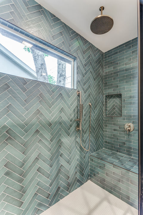 home remodeling of shower with green tile.