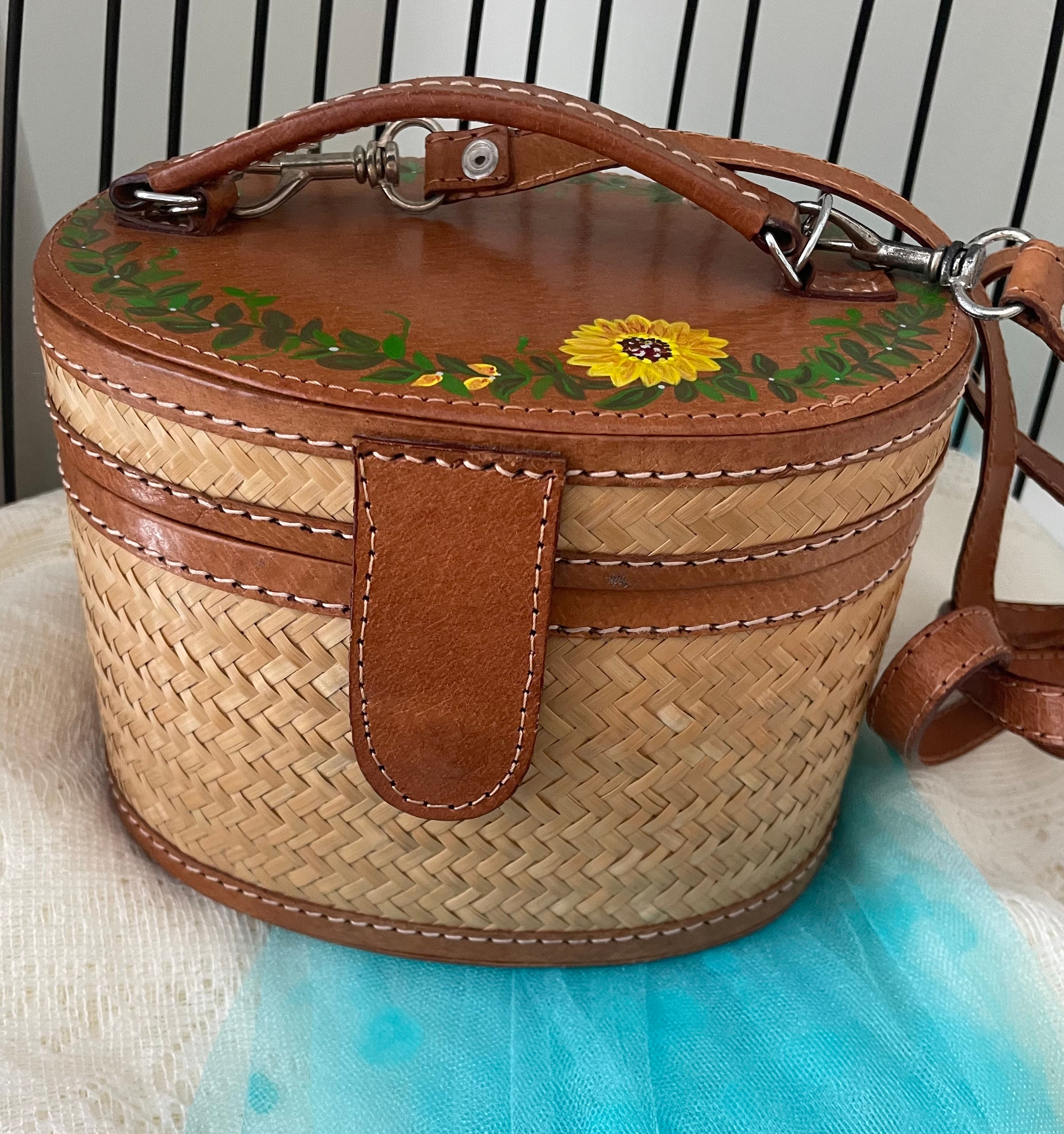 Handbag with sunflower design and woven sides on a decorative surface. DANA ~ Vintage Woven Handbag