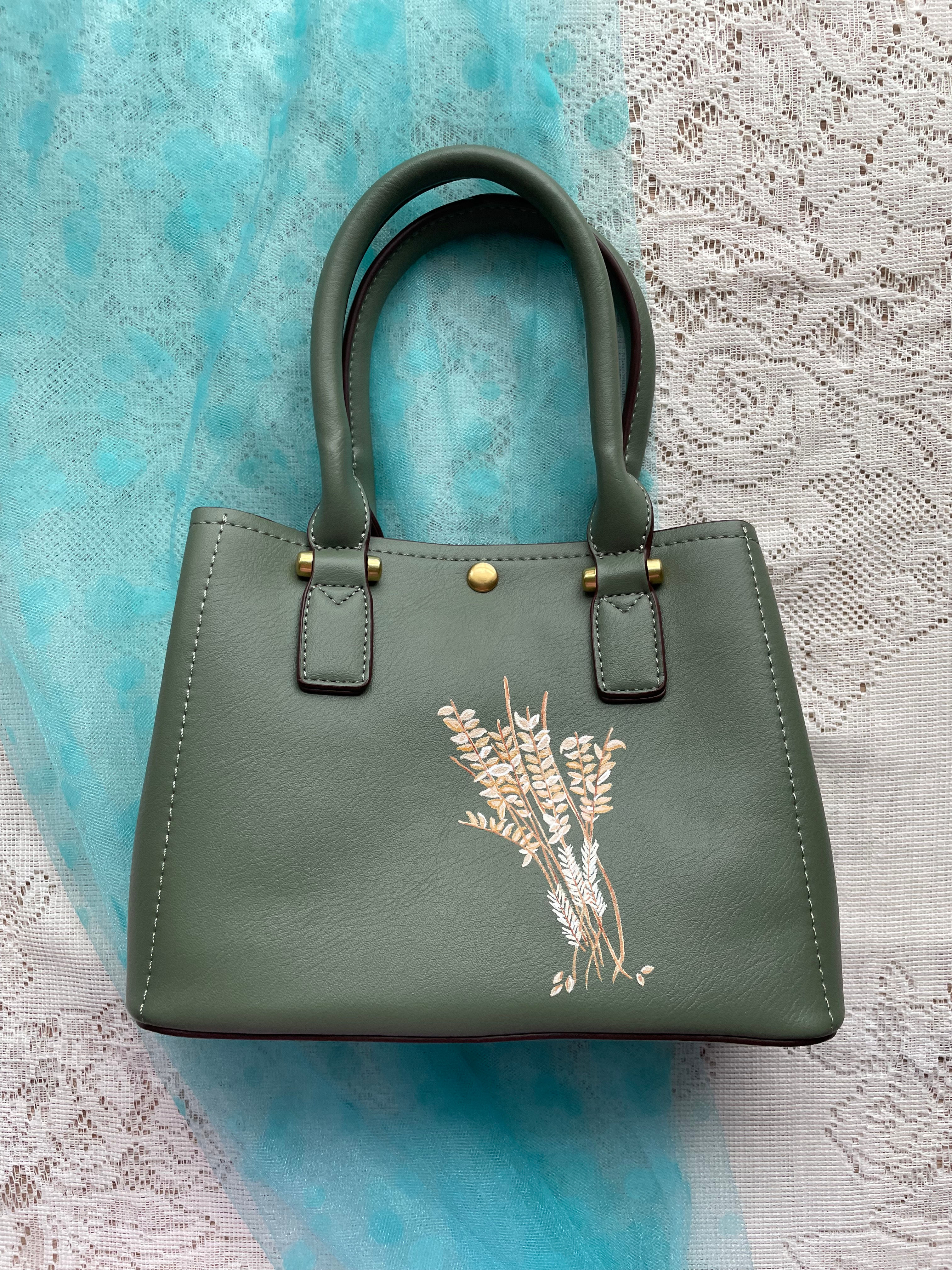 Sage green handbag with floral embroidery sixteensisters.com. This trendy bag