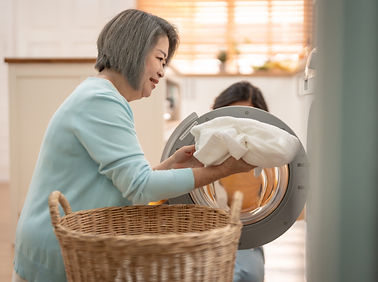 asian-senior-woman-put-dirty-clothes-to-washing-ma-2024-12-23-23-13-33-utc.jpg